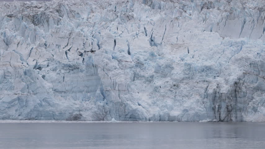 a close tilt up clip of the terminus face of hubbard glacier in alaska of the usa