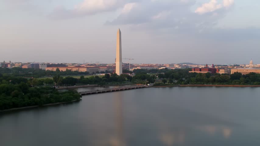 Aerial View of Washington DC Skyline with Washington Monument and Reflecting Water	
