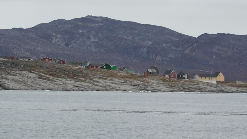 Oqaatsut Coastal Settlement Viewed from Boat in Greenland