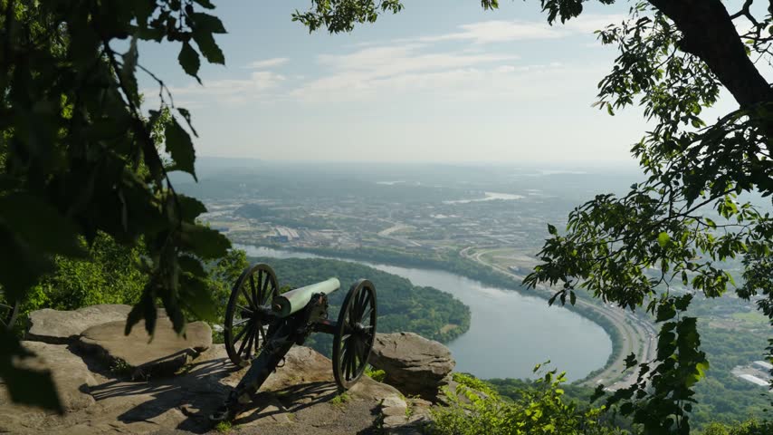 Scenic view of a Civil War cannon on Lookout Mountain with the Tennessee River and Chattanooga in the background.
