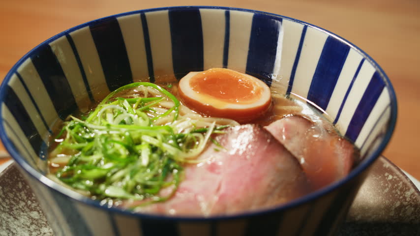 Japanese Ramen with Beef or chicken, rice noodles with fried meat, Tom Yam kung Spicy Thai asian soup, chef cooking in traditional korean chinese food. Close up of tasty vietnamese cuisine. 