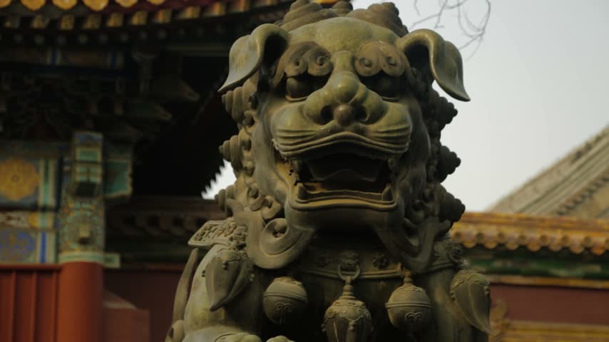 Traditional Guardian Lion Statue at Temple Entrance in Beijing, China