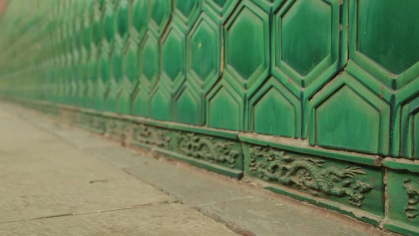 Ornate Green Glazed Wall with Dragon Reliefs at Lama Temple, Beijing, China