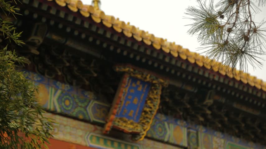 Traditional Chinese Temple Roof and Ornate Sign at Lama Temple in Beijing, China