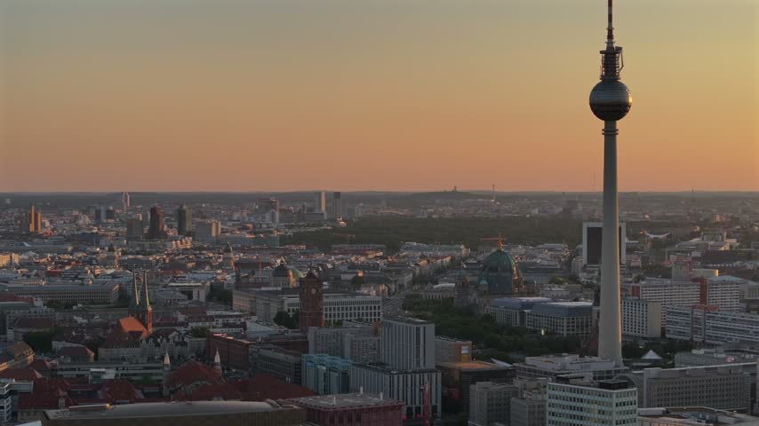 Alexanderplatz TV Tower Close Up View, Fernsehturm at Sunset Time in Berlin City Center, Aerial Parallax Drone Shot.