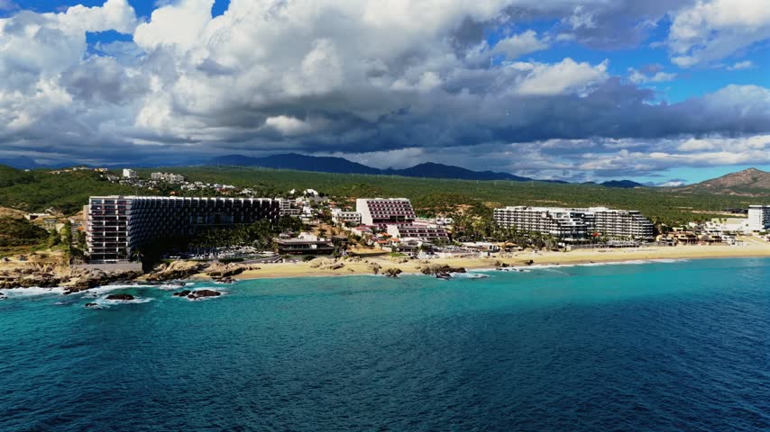 Aerial orbit around Grand Velas and Grand Velas Boutique luxury resorts along the Baja California Sur coastline near Los Cabos, Mexico
