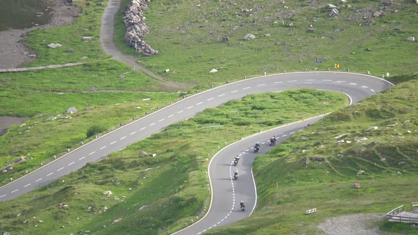 Bikers Riding Along the Scenic Grossglockner High Alpine Road in Austria