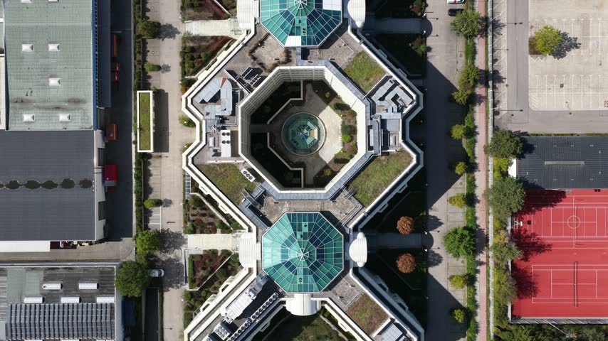 Aerial View of Modern X-Shaped Sustainable Office Building in Munich Germany