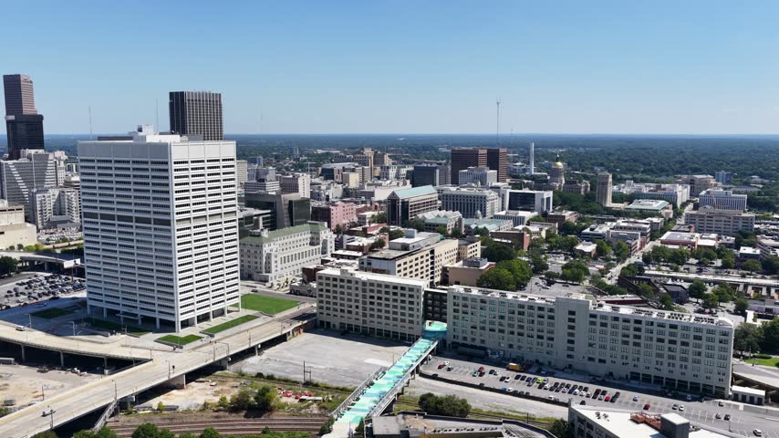 Aerial footage of Skyscrapers and office buildings in the skyline in Atlanta Georgia USA