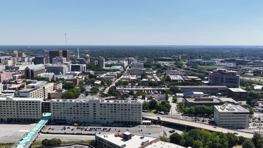 Aerial footage of Skyscrapers and office buildings in the skyline in Atlanta Georgia USA
