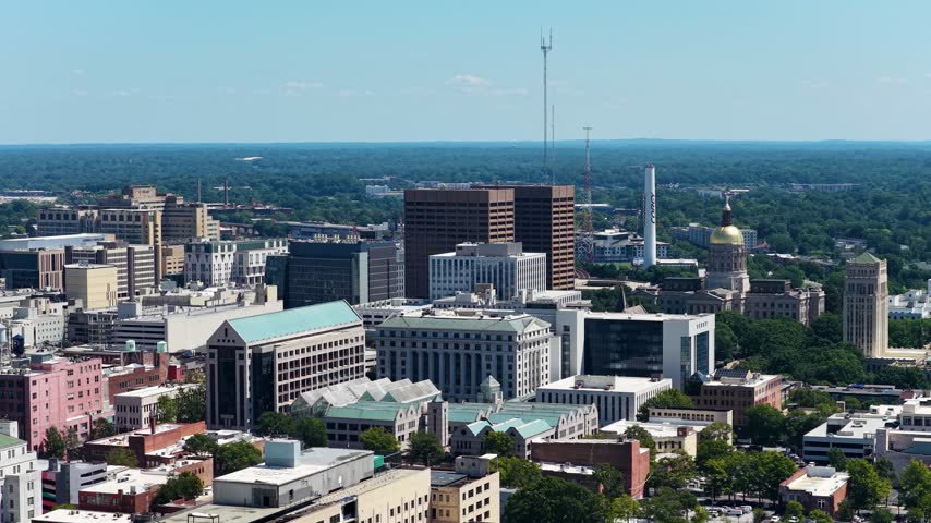 Aerial footage of Skyscrapers and office buildings in the skyline in Atlanta Georgia USA