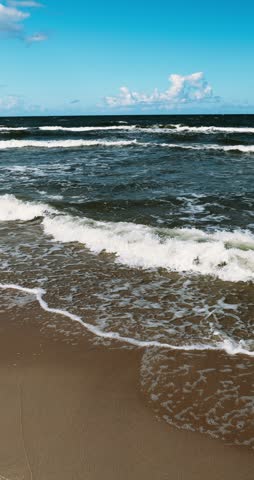 Poland, Stegna - 06-05-2026: People resting on a beach of Baltic Sea.