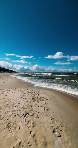 Poland, Stegna - 06-05-2026: People resting on a beach of Baltic Sea.