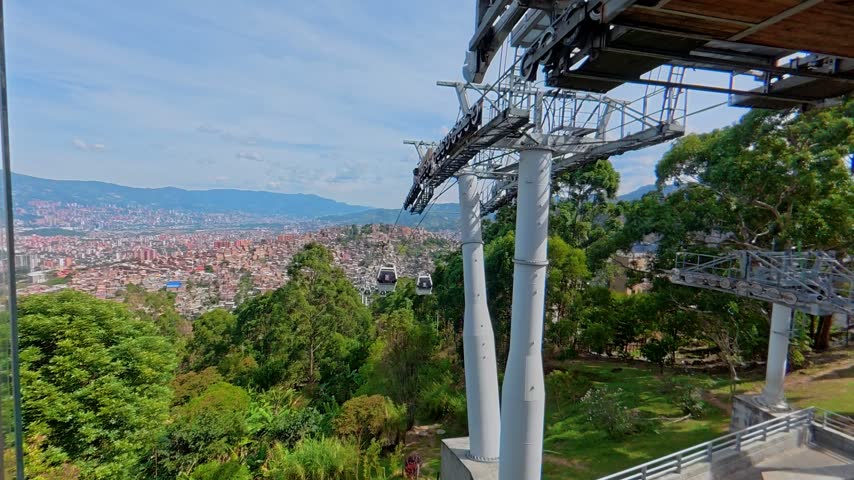 Scenic view of medellin, colombia, from the metrocable public transport system approaching a station