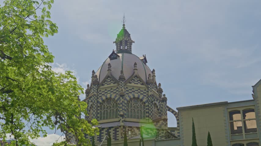 Majestic view of the palace of culture located in botero plaza in medellin, colombia on a sunny day