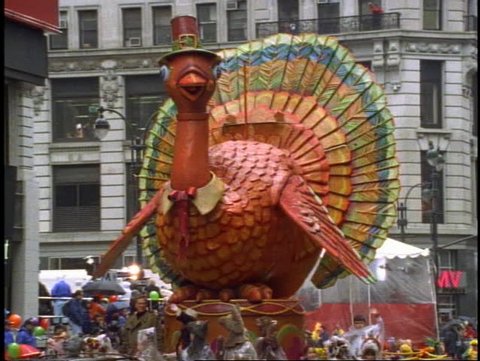 NEW YORK CITY - NEW YORK - CIRCA - 2001: New York Thanksgiving Day Parade, Tom Turkey float passing on 34th Street, shot on Eastman Kodak film