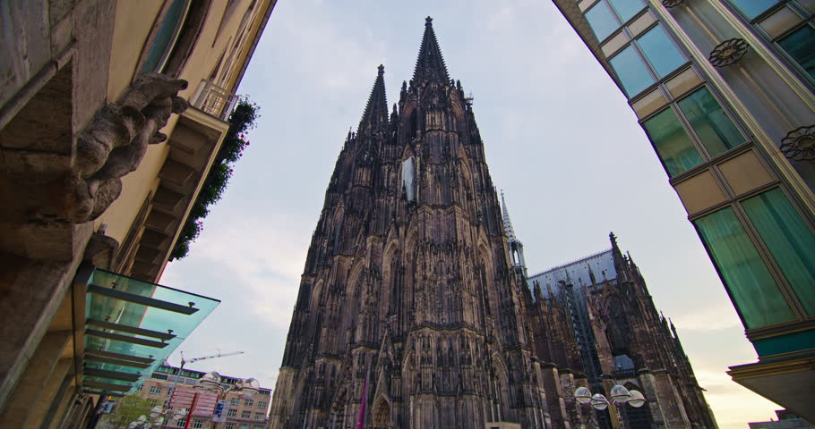 Cathedral spires Cologne Germany architecture cityscape create a striking historic landmark view with Gothic church towers rising above the European city