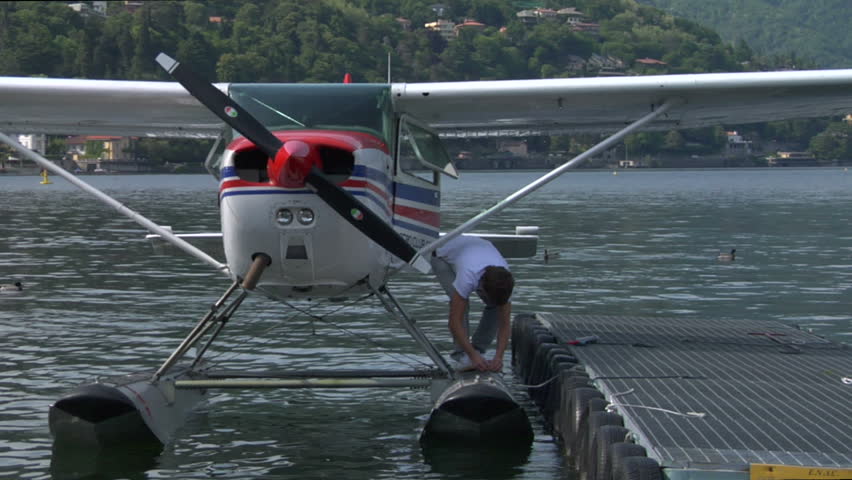 Floatplane on a lake at docks