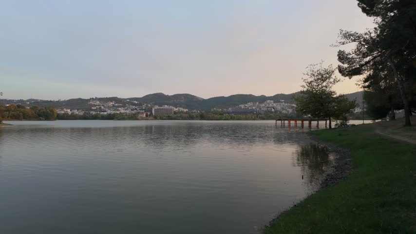 Pan shot of lake during sunset