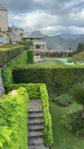 Gardens of Villa Cimbrone with mountain landscape in the background, Ravello, Amalfi Coast, Italy