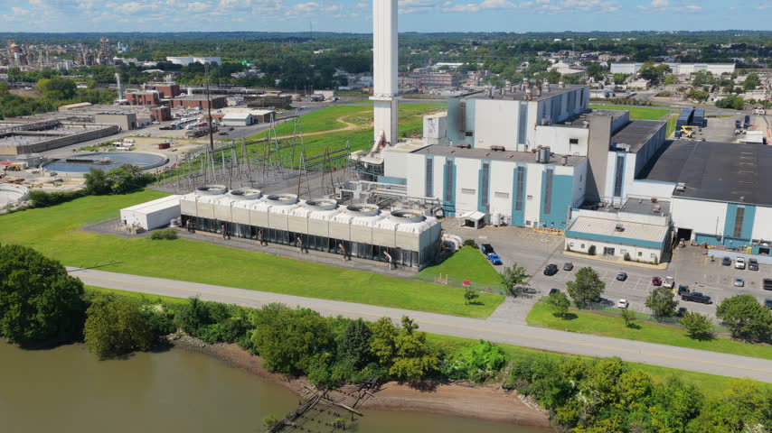 High angle aerial view of industrial cooling towers at a power plant