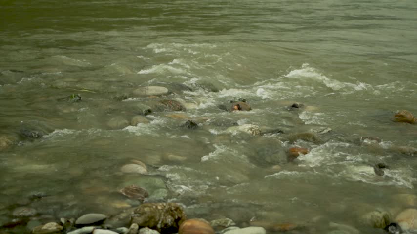 water flowing into the river