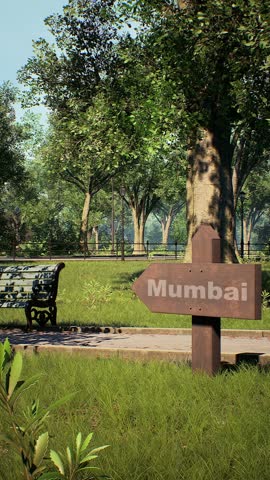 Vertical Wooden directional arrow sign with Mumbai text in a lush green park with deer and trees