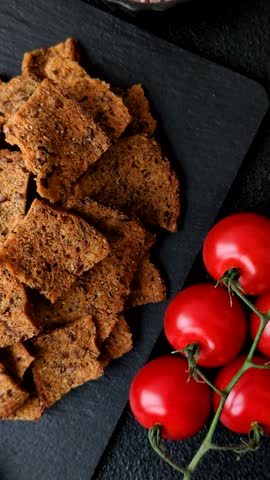 Croutons or crackers made from rye bread with garlic, salt, and spices. Croutons with salt