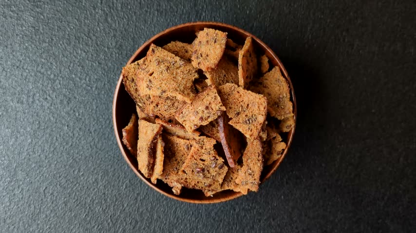 Croutons or crackers made from rye bread with garlic, salt, and spices. Croutons with salt