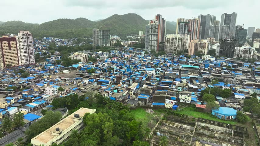 top view of Mumbai urban landscape with dense housing with mangroves 