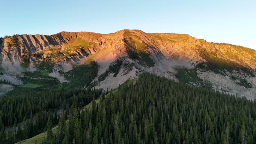 Colorado USA. Drone Shot of Scenic Landscape at Sunset, Hills and Pine Forest in Rocky Mountains