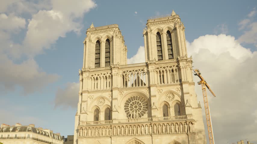 Historic Facade and Twin Towers of Notre-Dame Cathedral in Paris, France