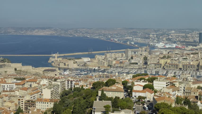 Beautiful aerial view of the city of Marseille in France, showing the Old Port and the sea