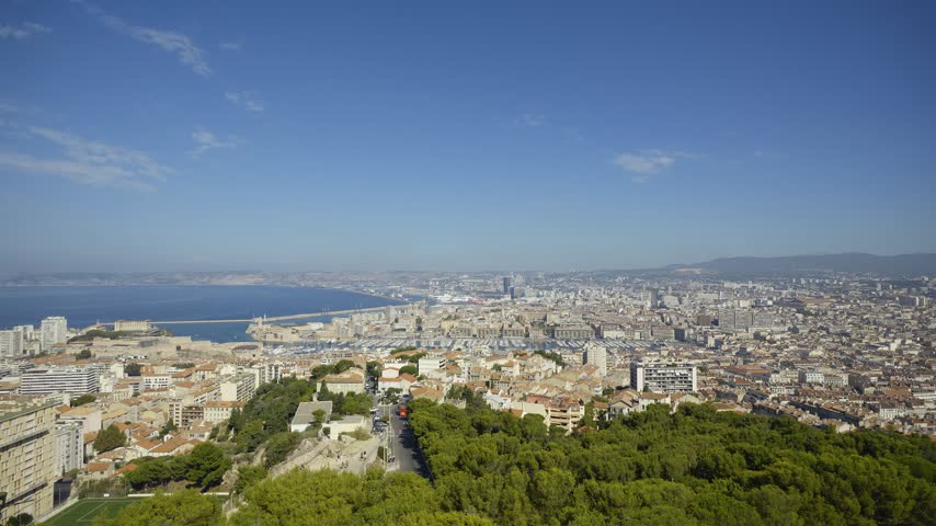 High angle view of the French city of Marseille with its port, buildings and surrounding nature