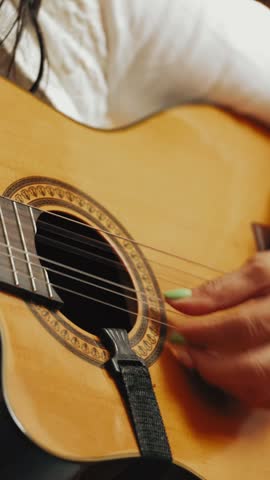 Close-up shot focusing on a female musician