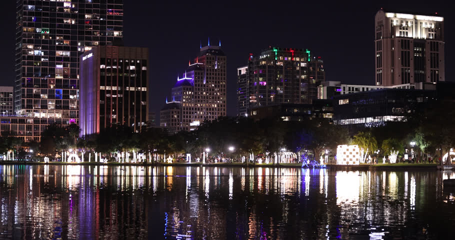 Night time view of the downtown Orlando, Florida, USA, skyline at night during the holiday months.