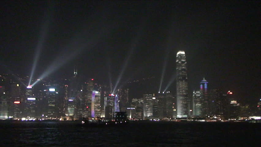 Hong Kong, May 2009: Lights flash over skyline of Hong Kong