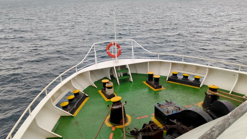 Overlooking bow of ferry vessel traveling on ocean within Fijian Lomaiviti Archipelago to Levuka Town, Ovalau Island in Fiji, South Pacific
