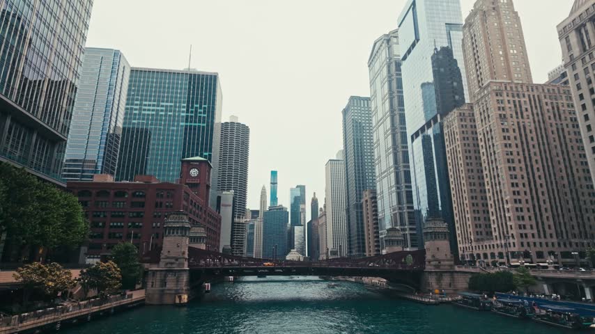 An impressive view of downtown Chicago buildings, bridges, and the Chicago River.