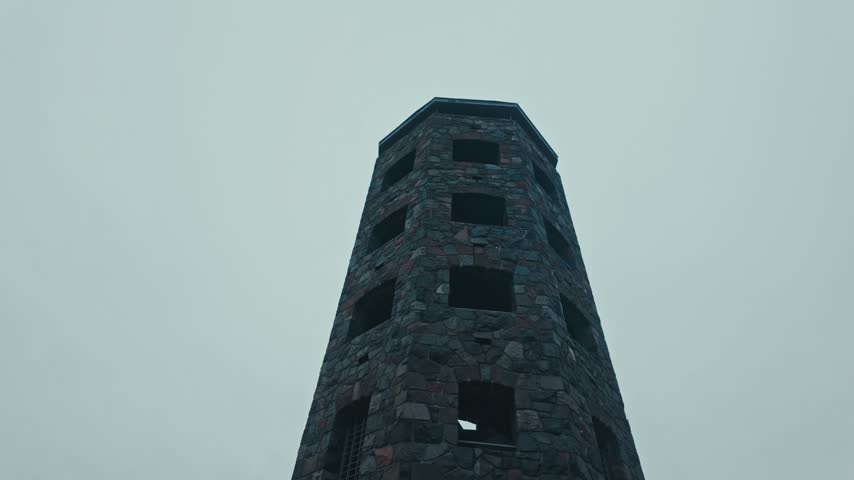 A low angle moving shot of Enger Tower in Duluth, Minnesota.
