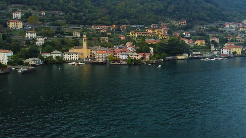 Beautiful aerial view of the picturesque village of torno on the shore of lake como, lombardy, italy, with its colorful houses and church