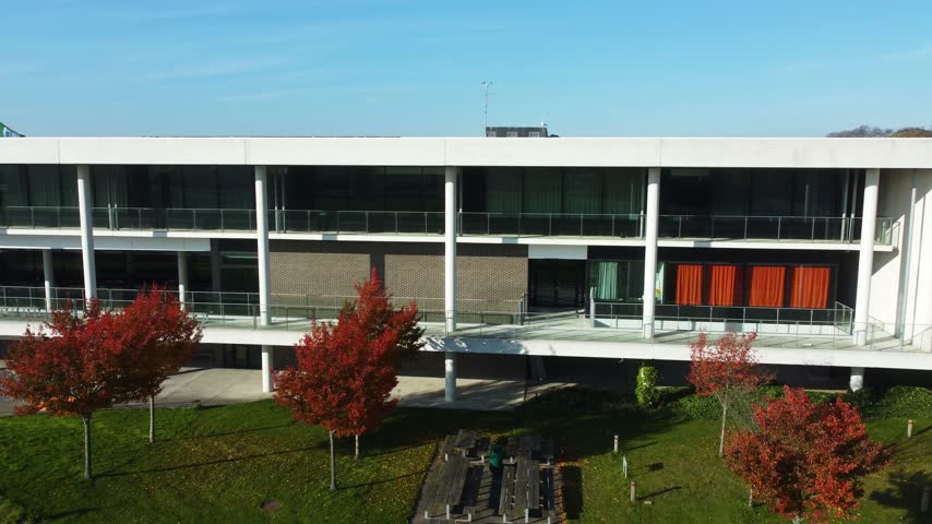 Modern office building with large windows and landscaping at Gammel Ega near Aarhus, Denmark