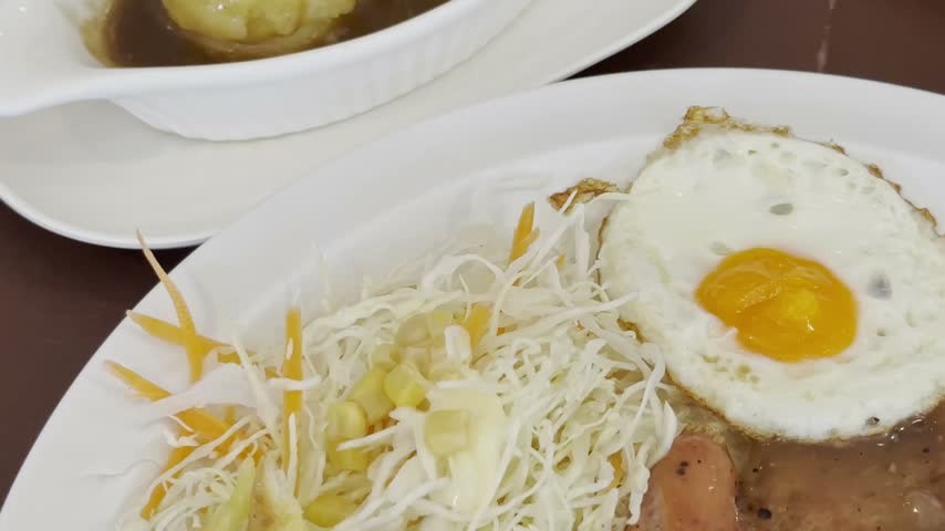 Grilled Meat Sausage Bread Cabbage Slaw Fried Egg Potato Gravy Plate