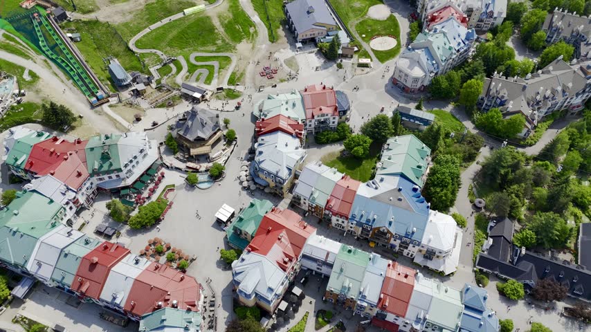 Aerial view of Mont Tremblant resort village, Quebec, Canada with lake, forest and mountain landscape in summer. g.