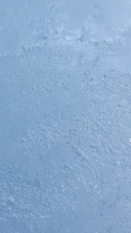 Bubble in blue ice in an ice cave at Valdez Glacier Lake in Alaska. 
