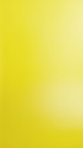Hands holding black and white credit cards on yellow background. Concept of payment, finance, shopping, and business transaction.
