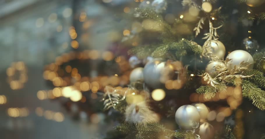 Christmas Tree Ornaments Reflected in Window, 4K Festive Holiday Decoration Close-Up
