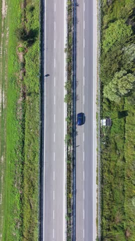 Aerial View of Traffic Moving Along a Provincial Road Near Milan, Italy