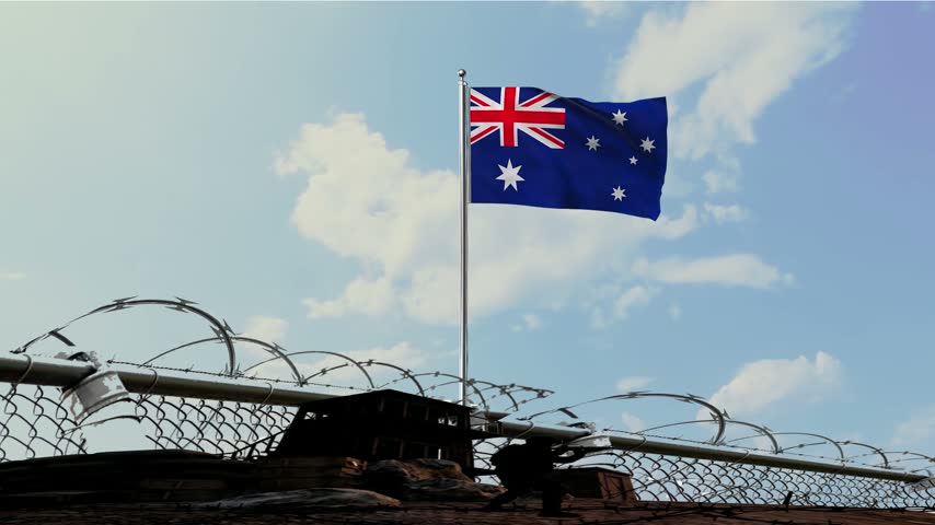 Australian Military Outpost with Waving Flag and Barbed Wire Fence