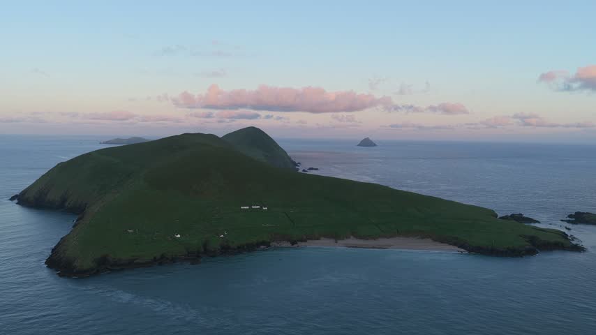Drone view of the rugged Atlantic coastline of Great Blasket Island at dusk, off Ireland